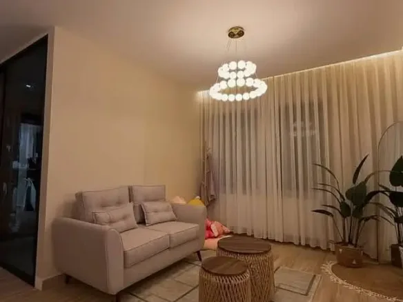 Fully finished hotel-style apartment with air conditioning and a sea view for sale in a prime location on the Suez Road, behind City Centre Almaza, one minute from Heliopolis Airport and minutes from the Sheraton.