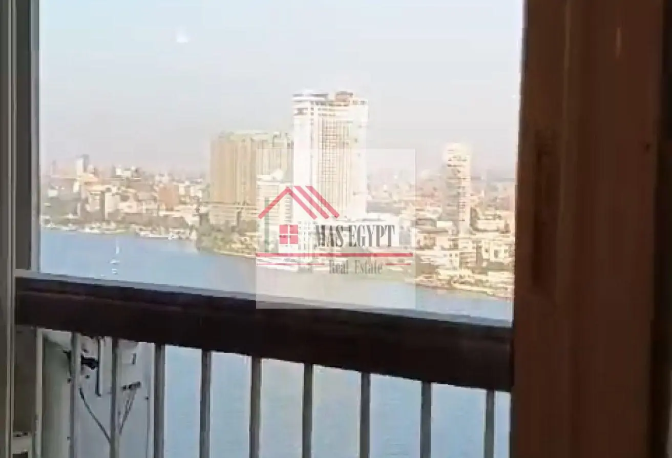 For embassies and foreigners: Hotel apartment for sale on Nile Street, Dokki