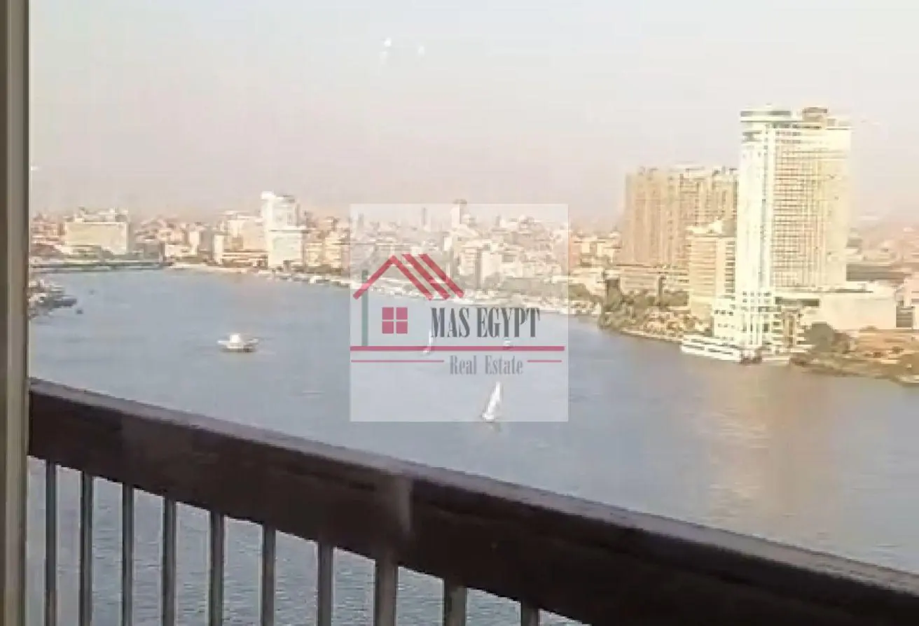 For embassies and foreigners: Hotel apartment for sale on Nile Street, Dokki